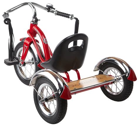 This retro-styled children's trike is designed with a low center of gravity, making climbing on and off during play easy and safe. . Roadster tricycle schwinn